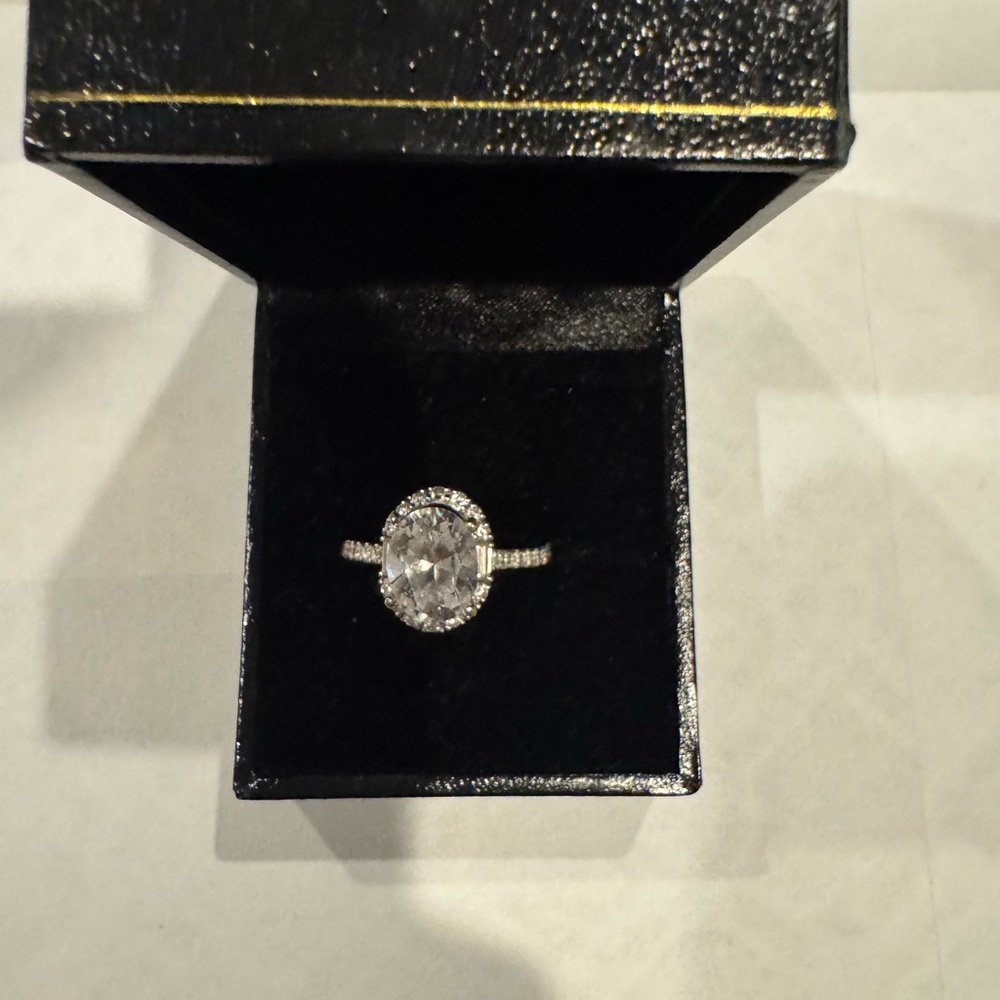 Sparkling Halo Oval Solitaire Ring - White